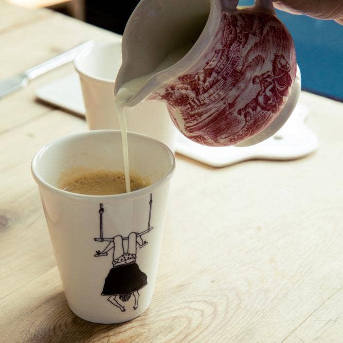 Cup trapeze girl