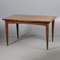 A 20TH CENTURY DRAW-LEAF DINING TABLE