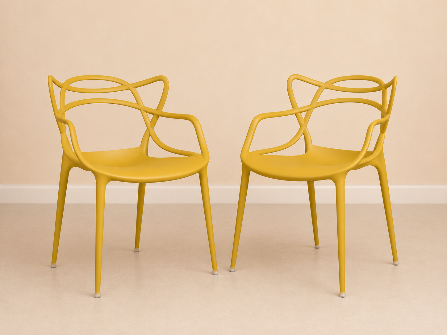 PHILIPPE STARCK & EUGENI QUITLLET FOR KARTELL. A PAIR OF MASTERS CHAIRS